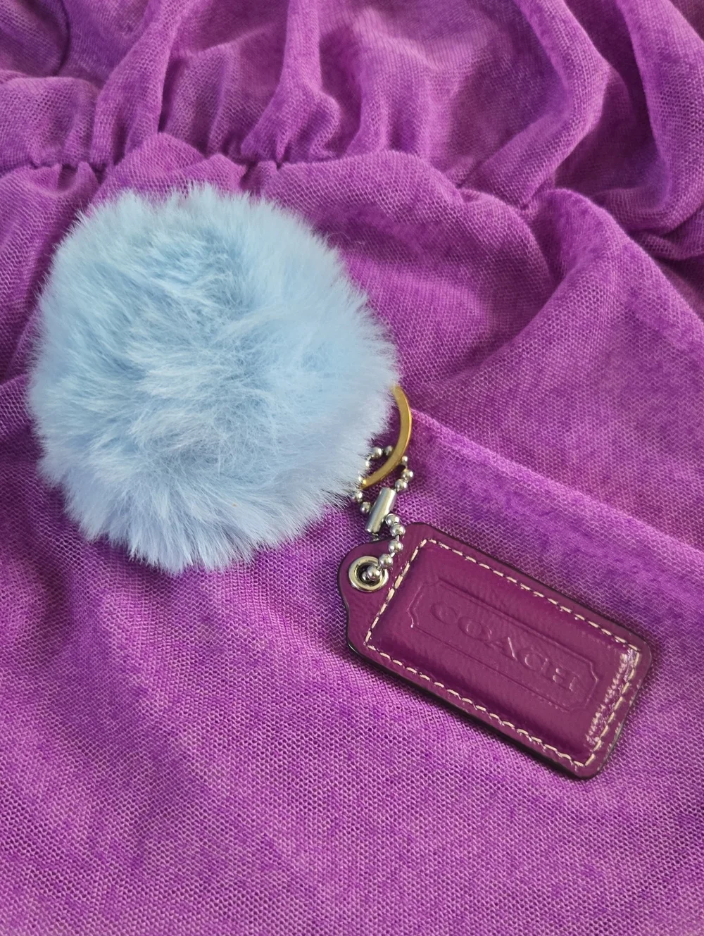 Coach Purple Leather Hangtag With Light Blue Fur Pom Pom Charm